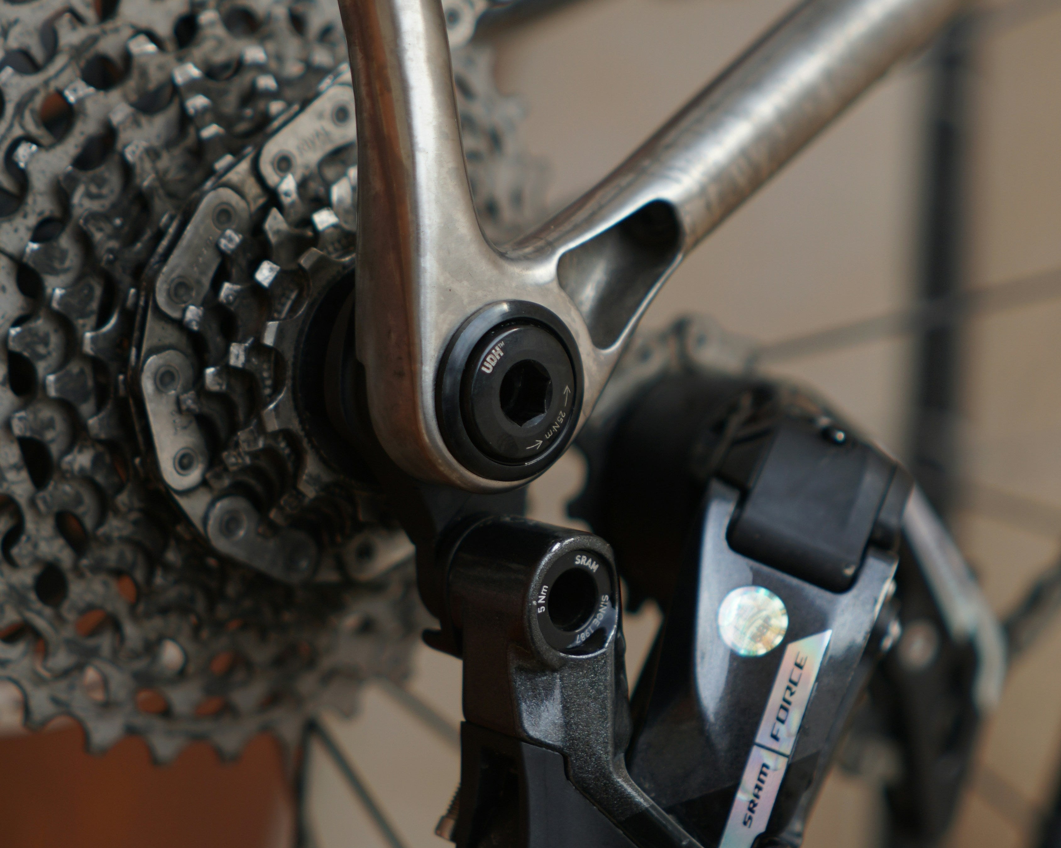 Exposed rear derailleur on a bike before travel prep