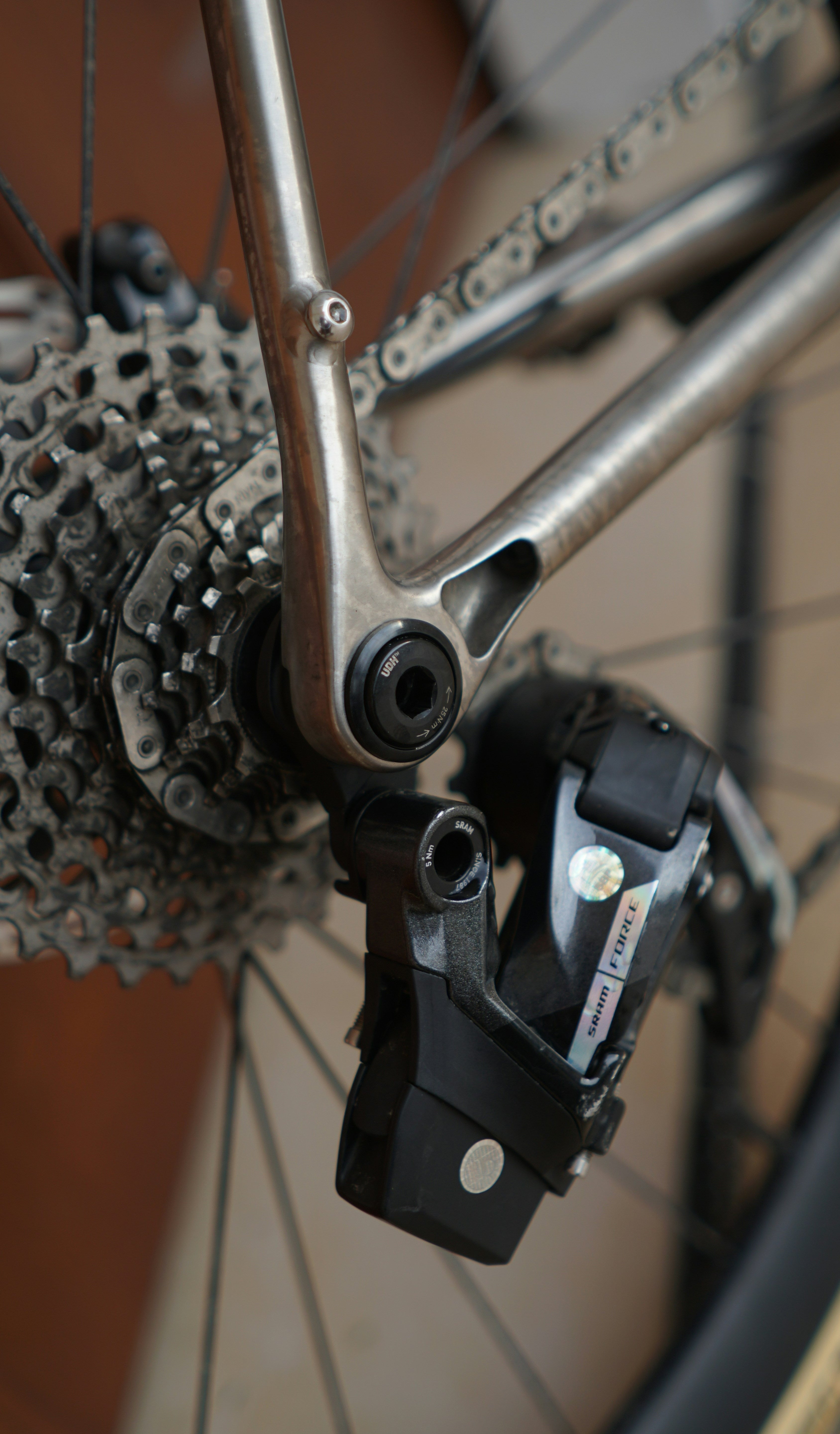 Exposed rear derailleur on a bike before travel prep